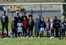 Trois jeunes du foyer Marie-Foilaine Desolneux animateurs dans un stage de football